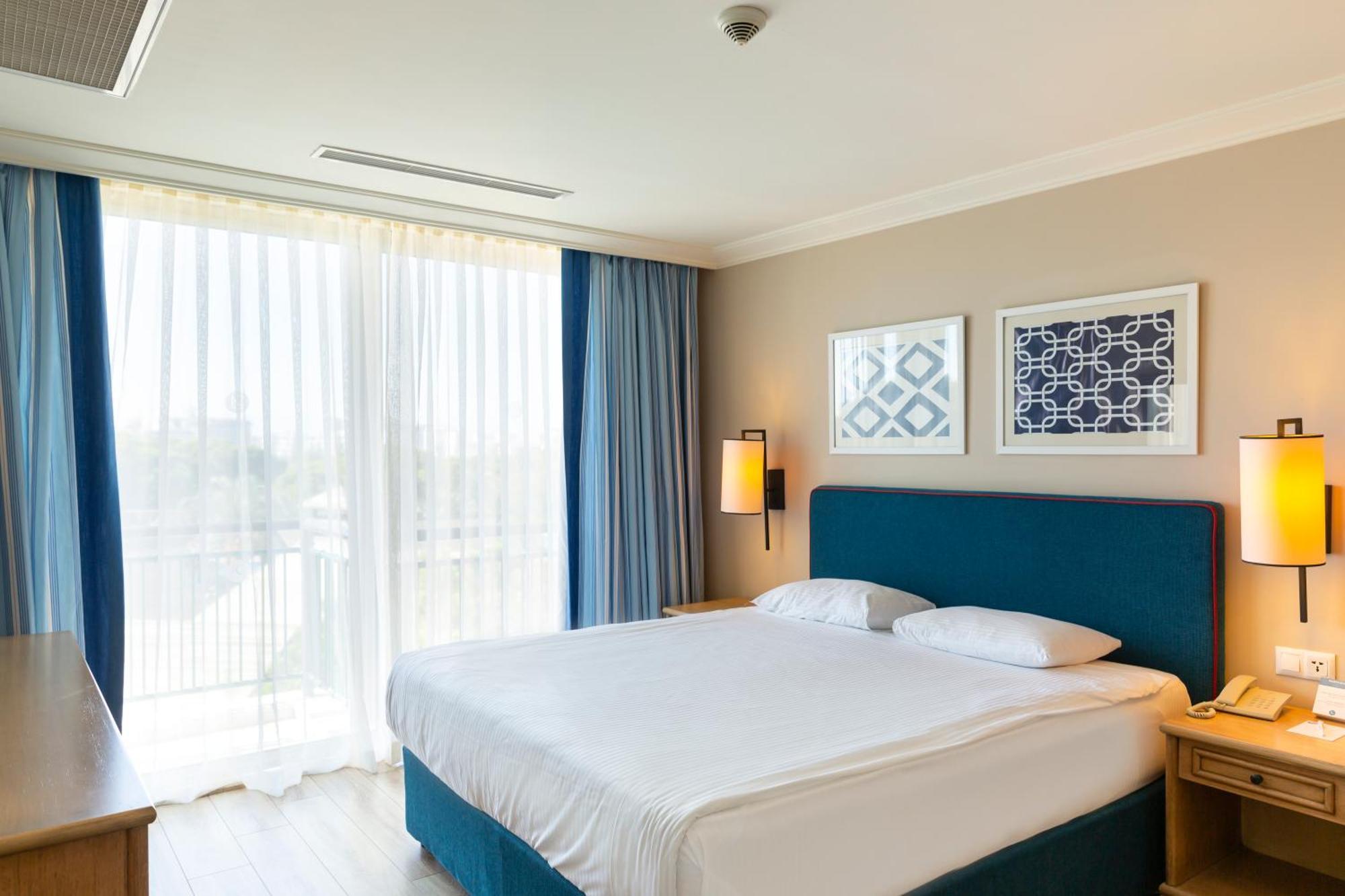 Ic Hotels Green Palace - Kids Concept Antália Quarto foto A bedroom at the hotel